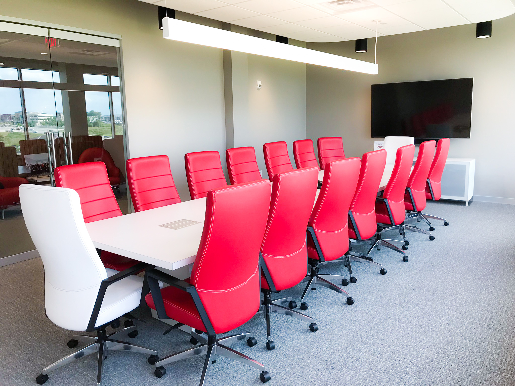 Conference room with red chairs